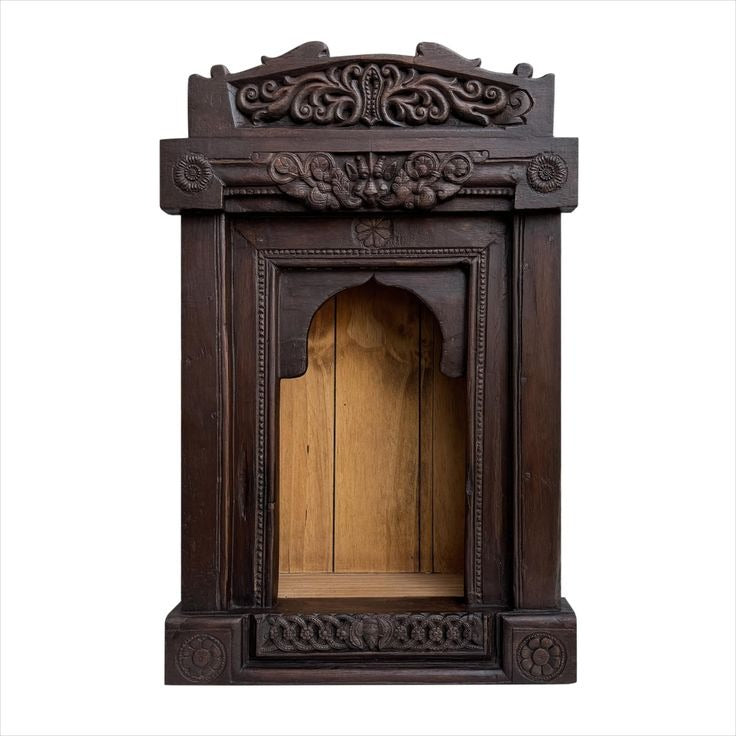 Elegant wall-mounted pooja mandir with decorative wall shelves, featuring solid wood construction and intricate carvings. This versatile unit can also serve as a floating bookshelf or a vintage wall decor piece, blending functionality and aesthetics seamlessly Brass Idol Shelf
