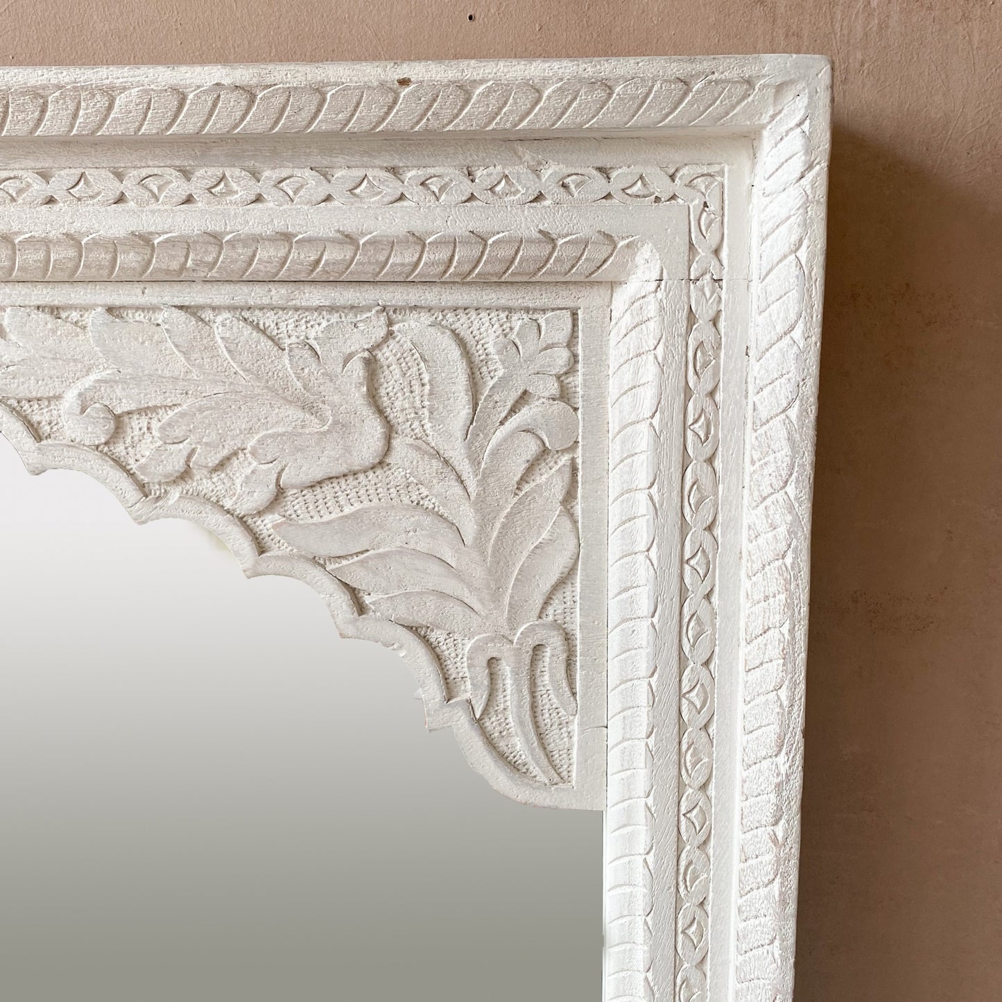Jharokha mirror with a stunning carved wood frame, showcasing a big vintage mirror that exudes timeless elegance. This oval wood mirror is an excellent choice for vintage wall decor, combining traditional craftsmanship with a modern flair