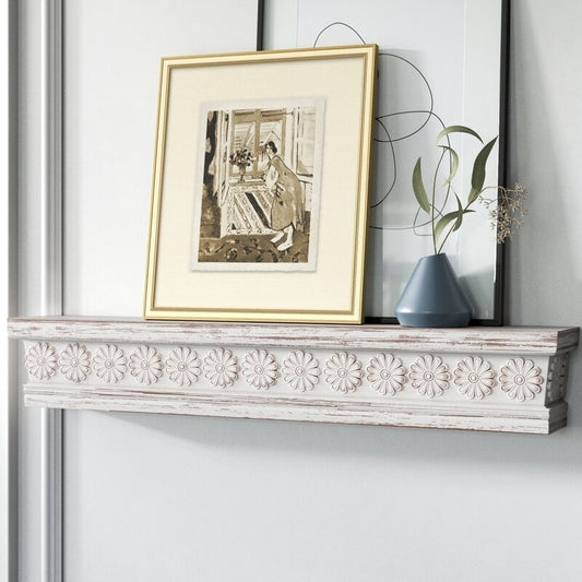 Shabby chic decorative wall shelf in white, intricately carved with vintage detailing. This charming wall decor shelf adds a rustic and antique touch to your living room, bedroom, or hallway. Perfect for showcasing decorative items, books, or small plants, it brings elegance and vintage appeal to any space