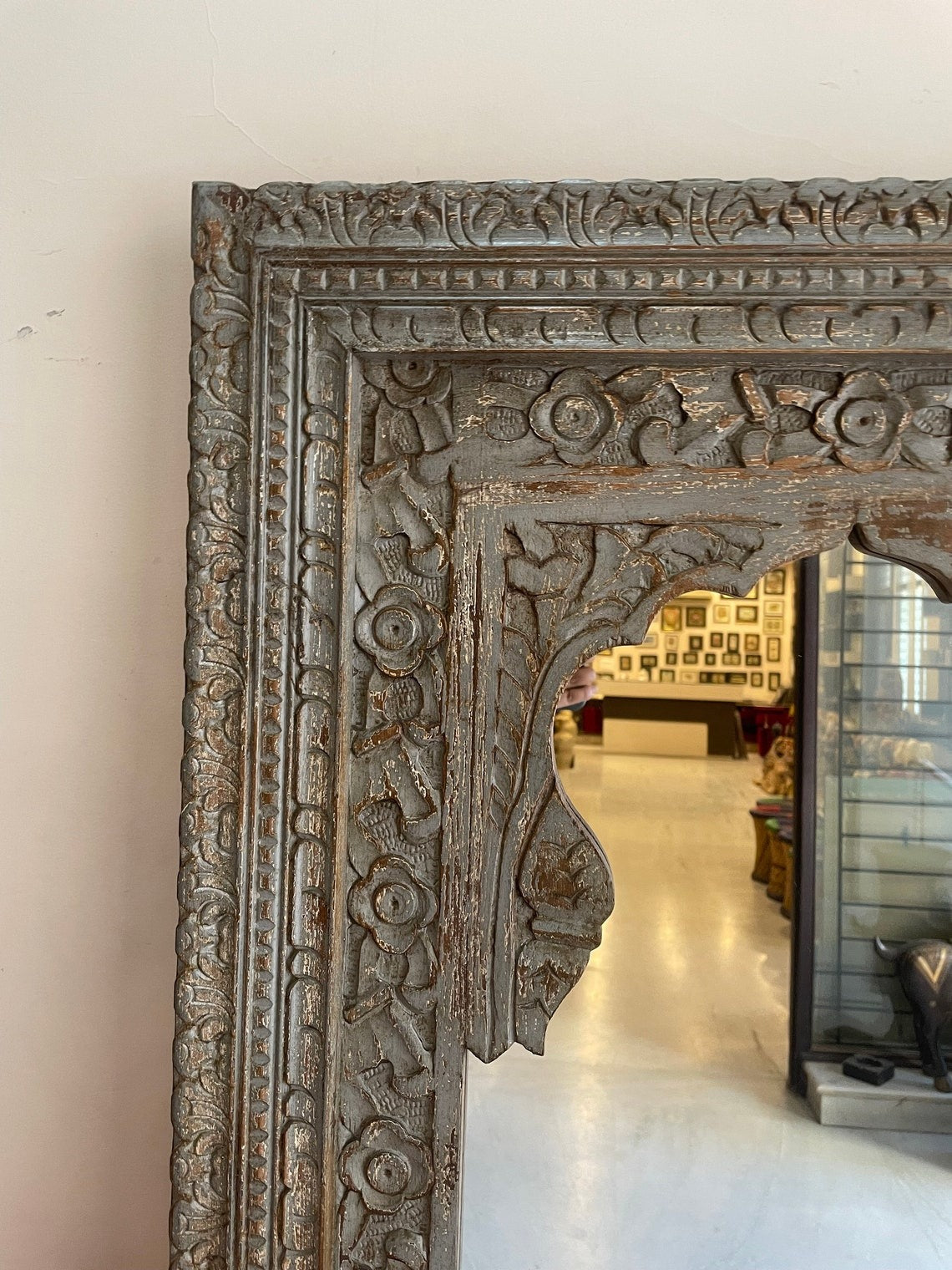 Large arch jharokha mirror with an intricate antique brass mirror frame, showcasing traditional Indian craftsmanship and vintage-style elegance