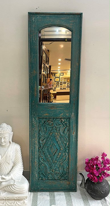 A custom-sized carved mirror framed in a jharokha mirror style, perfect as a vintage floor mirror or antique wall art centerpiece."
"Large black framed jharokha mirror with a big vintage mirror insert, combining traditional Indian designs with modern decorative trends.