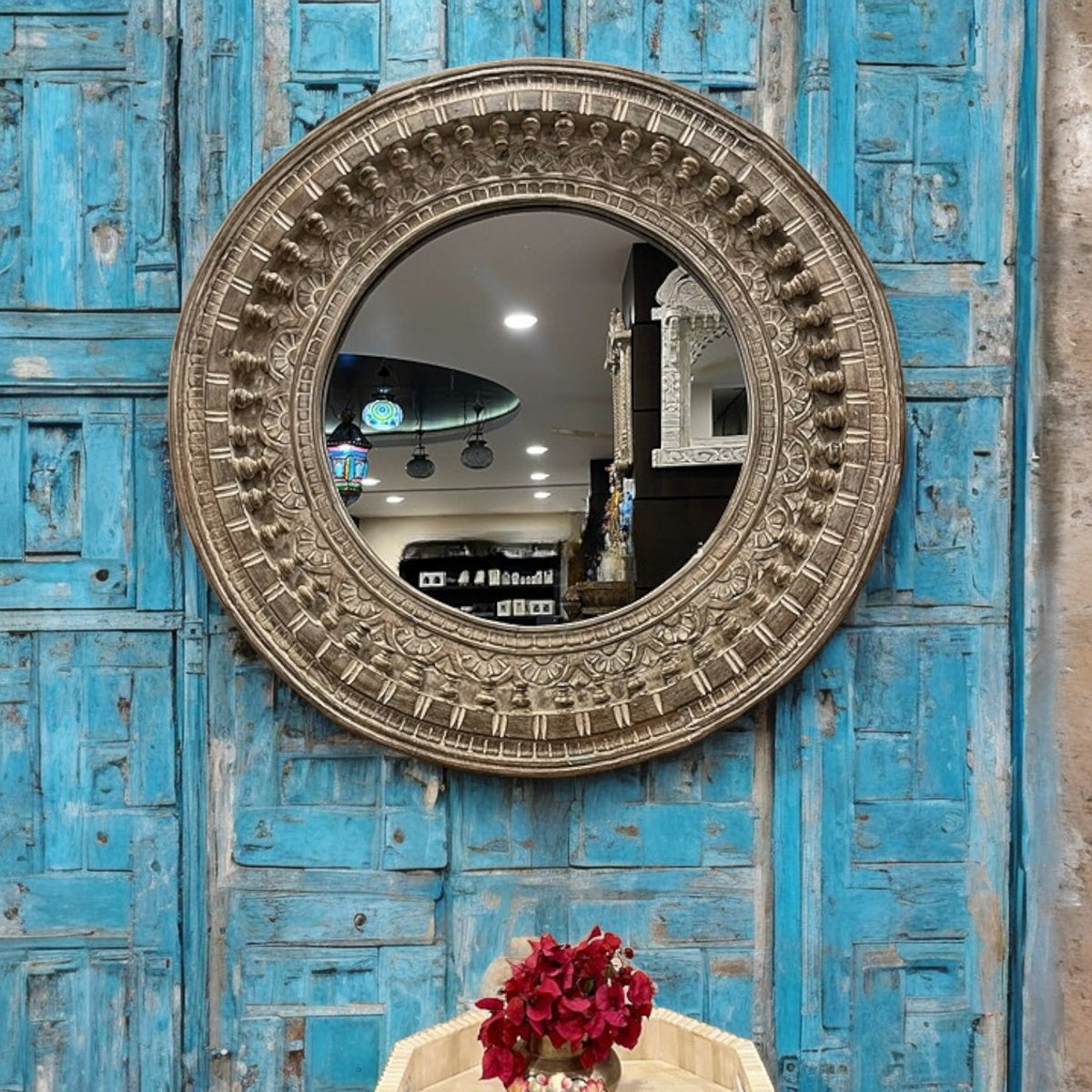 "Custom-sized jharokha mirror frame with a vintage bathroom mirror insert, featuring intricate wood carvings for a unique and stylish look