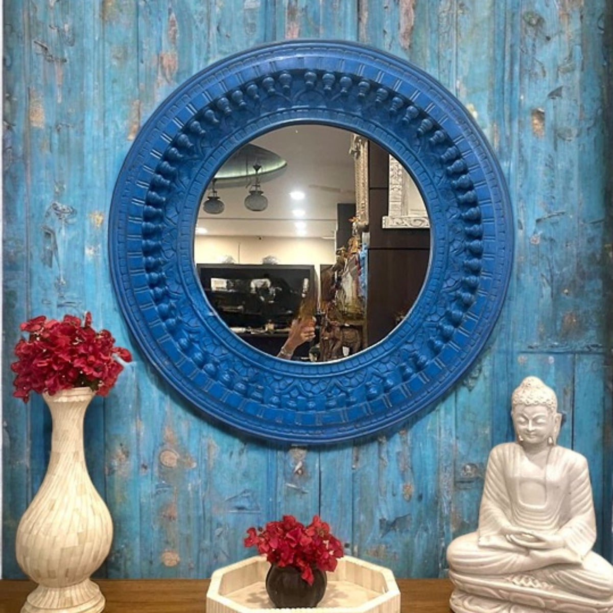 Antique brass mirror designed with a traditional jharokha frame, adding timeless appeal to retro wall art or modern interiors.