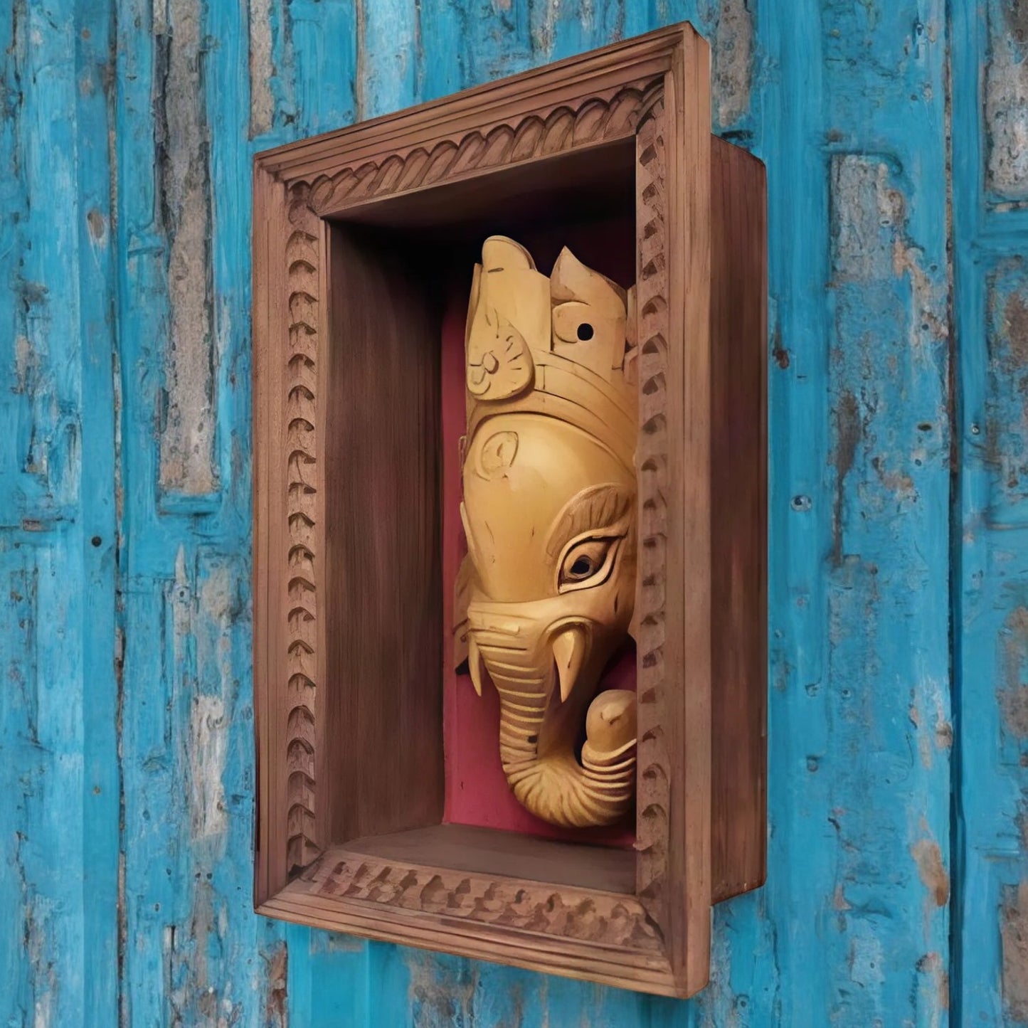 Wooden carved Ganesha wall decor in a handcrafted frame, featuring traditional Indian design, ideal for pooja rooms and antique home decor.
