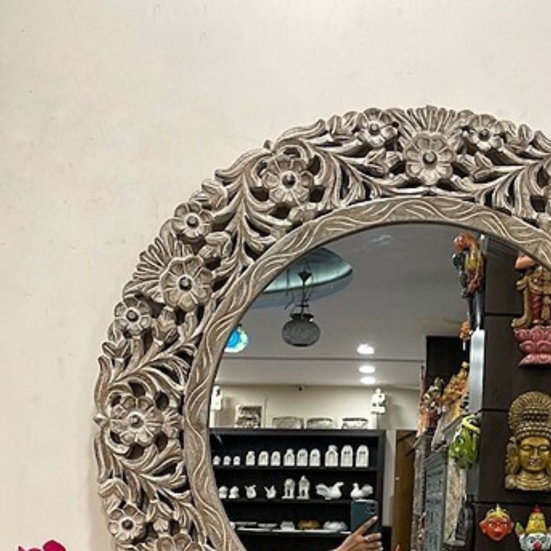 Handcrafted Jharokha mirror frame with bold carvings and a whitewashed finish, designed to elevate modern interiors with vintage elegance
