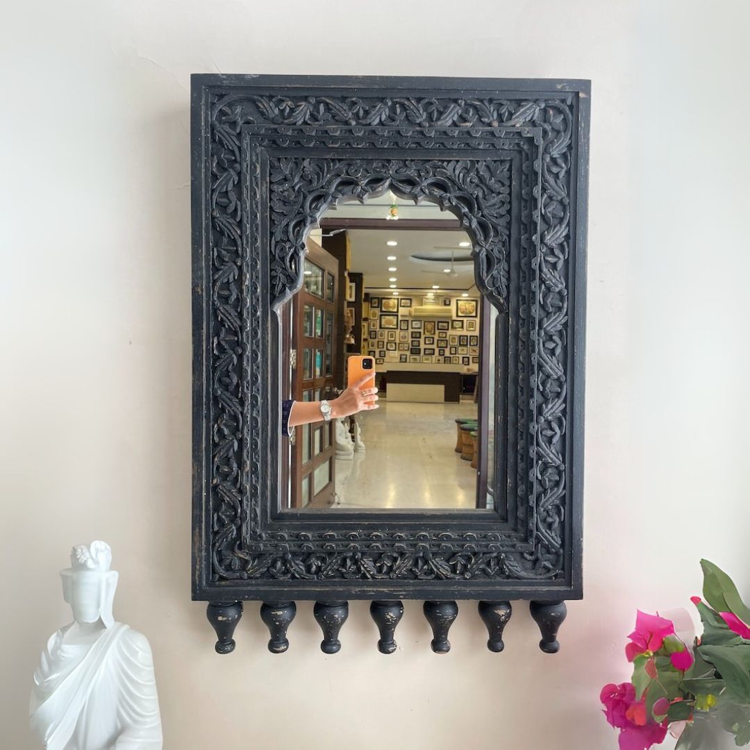 Exquisite whitewashed Jharokha mirror frame with ornate wood carvings, inspired by traditional Indian architecture, perfect for vintage bathroom decor or rustic bedroom interiors