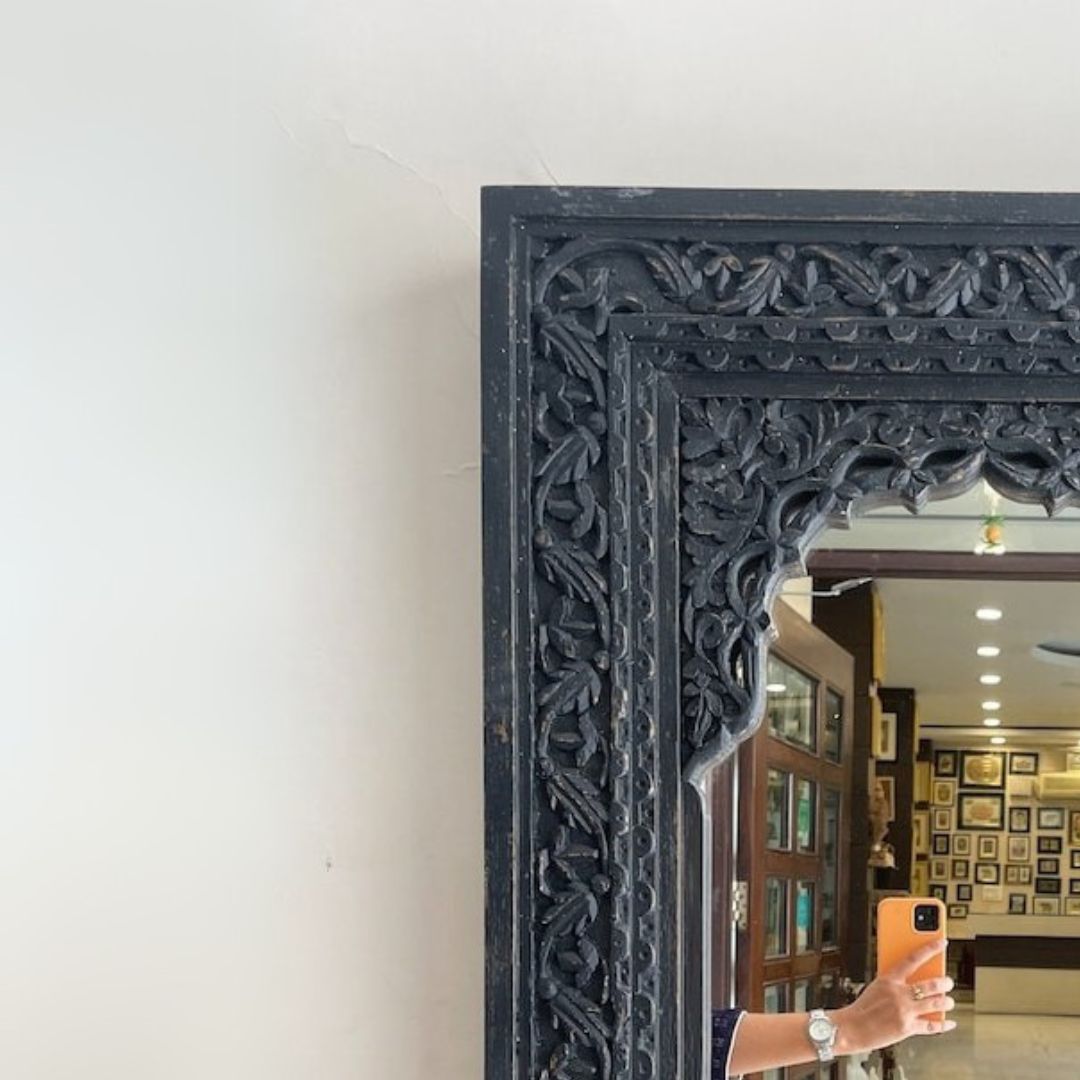 Handcrafted large vintage mirror featuring a distressed wood Jharokha frame with intricate details, ideal for Victorian-style living rooms or antique wall decor