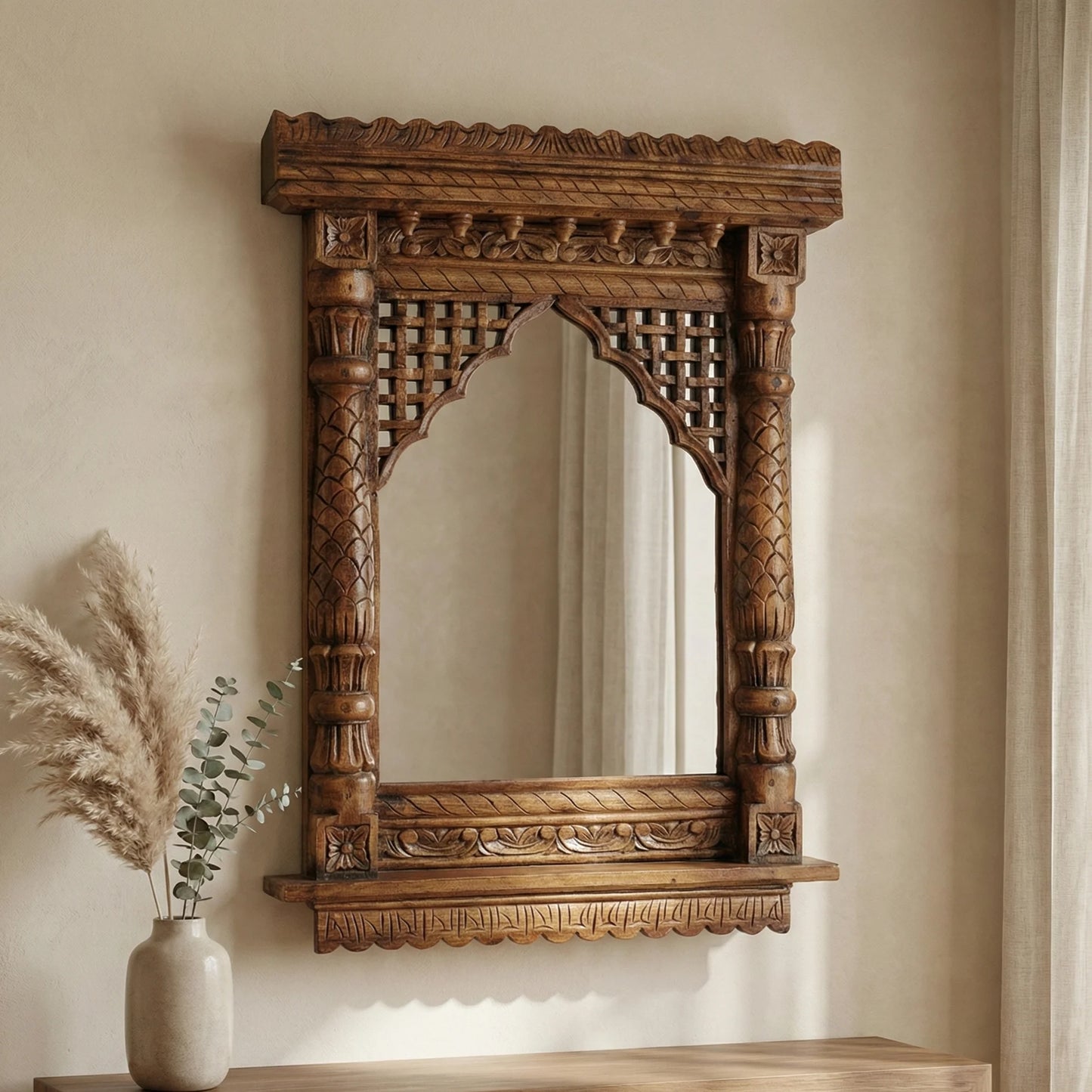 Detail of intricate carving on a round jharokha wooden mirror frame