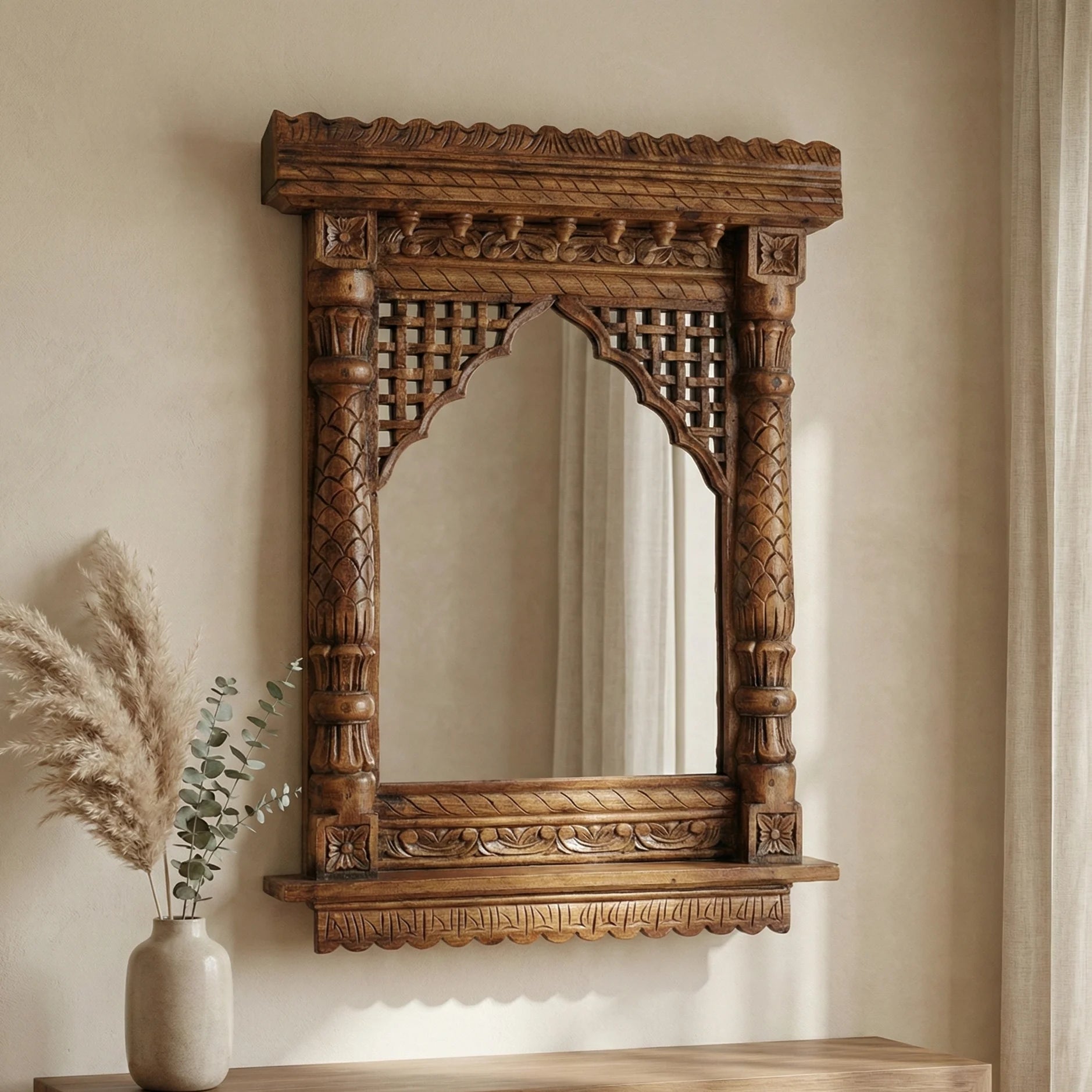 Detail of intricate carving on a round jharokha wooden mirror frame