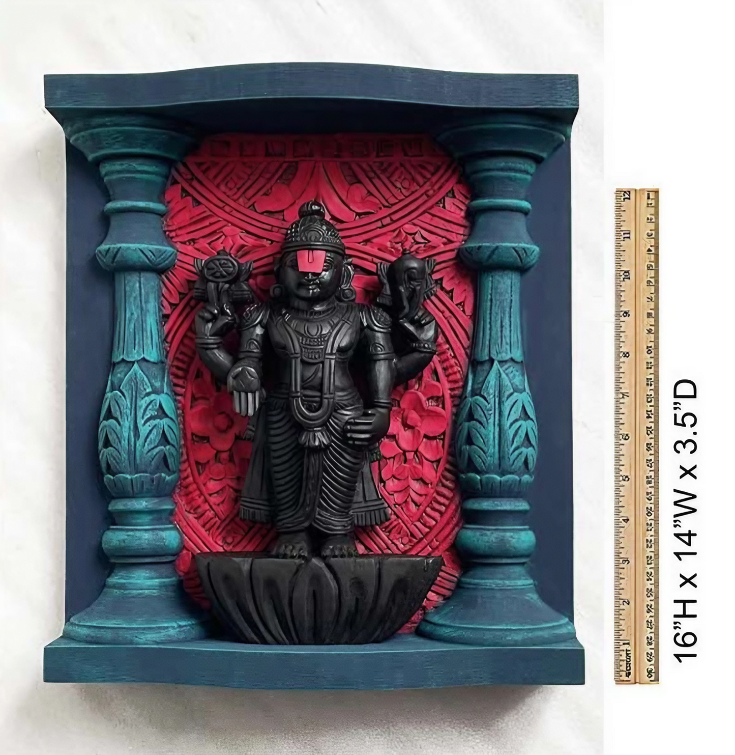 Handcrafted wooden Lord Vishnu wall art with vibrant colors, intricate carvings, and temple-inspired design, measuring 16 inches tall, 14 inches wide, and 3.5 inches deep, mounted on a decorative wooden frame with red and blue accents.
