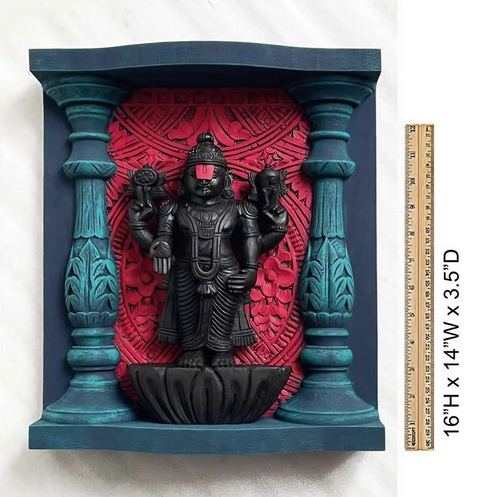 Handcrafted wooden Lord Vishnu wall art with vibrant colors, intricate carvings, and temple-inspired design, measuring 16 inches tall, 14 inches wide, and 3.5 inches deep, mounted on a decorative wooden frame with red and blue accents.