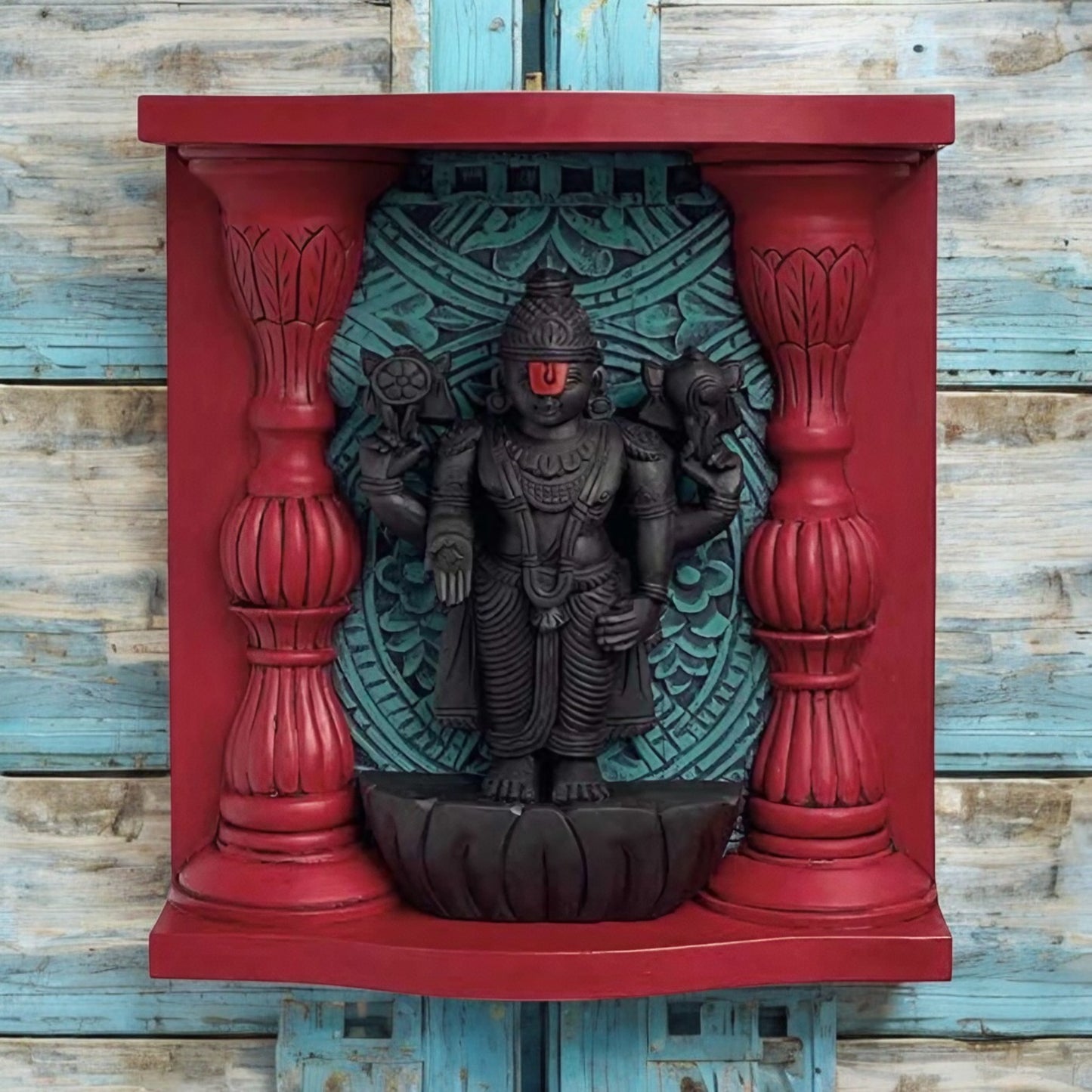 Handcrafted wooden Lord Vishnu wall art with vibrant colors, intricate carvings, and temple-inspired design, measuring 16 inches tall, 14 inches wide, and 3.5 inches deep, mounted on a decorative wooden frame with red and blue accents.