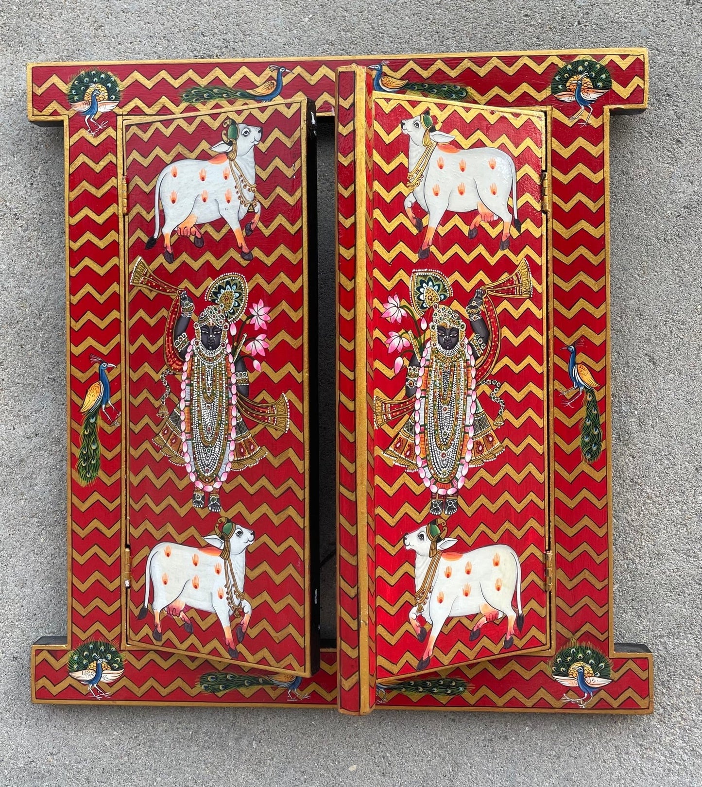 Hand-painted wooden temple door panel in red and gold chevron design with traditional Indian devotional artwork, solid wood mandir decor 16x18 inches Traditional hand-painted wooden mandir door panel with red background and golden chevrons, Indian temple decor solid wood Handcrafted wooden temple doors panel featuring Indian devotional art, red and gold chevron pattern, home mandir decor Indian hand-painted wooden pooja mandir door panel with traditional motifs, red and gold solid wood wall decor Decorative