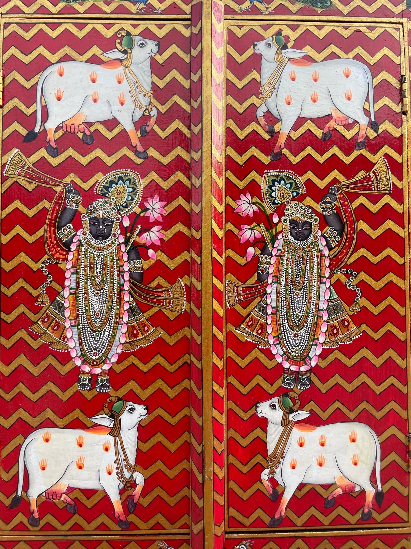 Hand-painted wooden temple door panel in red and gold chevron design with traditional Indian devotional artwork, solid wood mandir decor 16x18 inches Traditional hand-painted wooden mandir door panel with red background and golden chevrons, Indian temple decor solid wood Handcrafted wooden temple doors panel featuring Indian devotional art, red and gold chevron pattern, home mandir decor Indian hand-painted wooden pooja mandir door panel with traditional motifs, red and gold solid wood wall decor Decorative