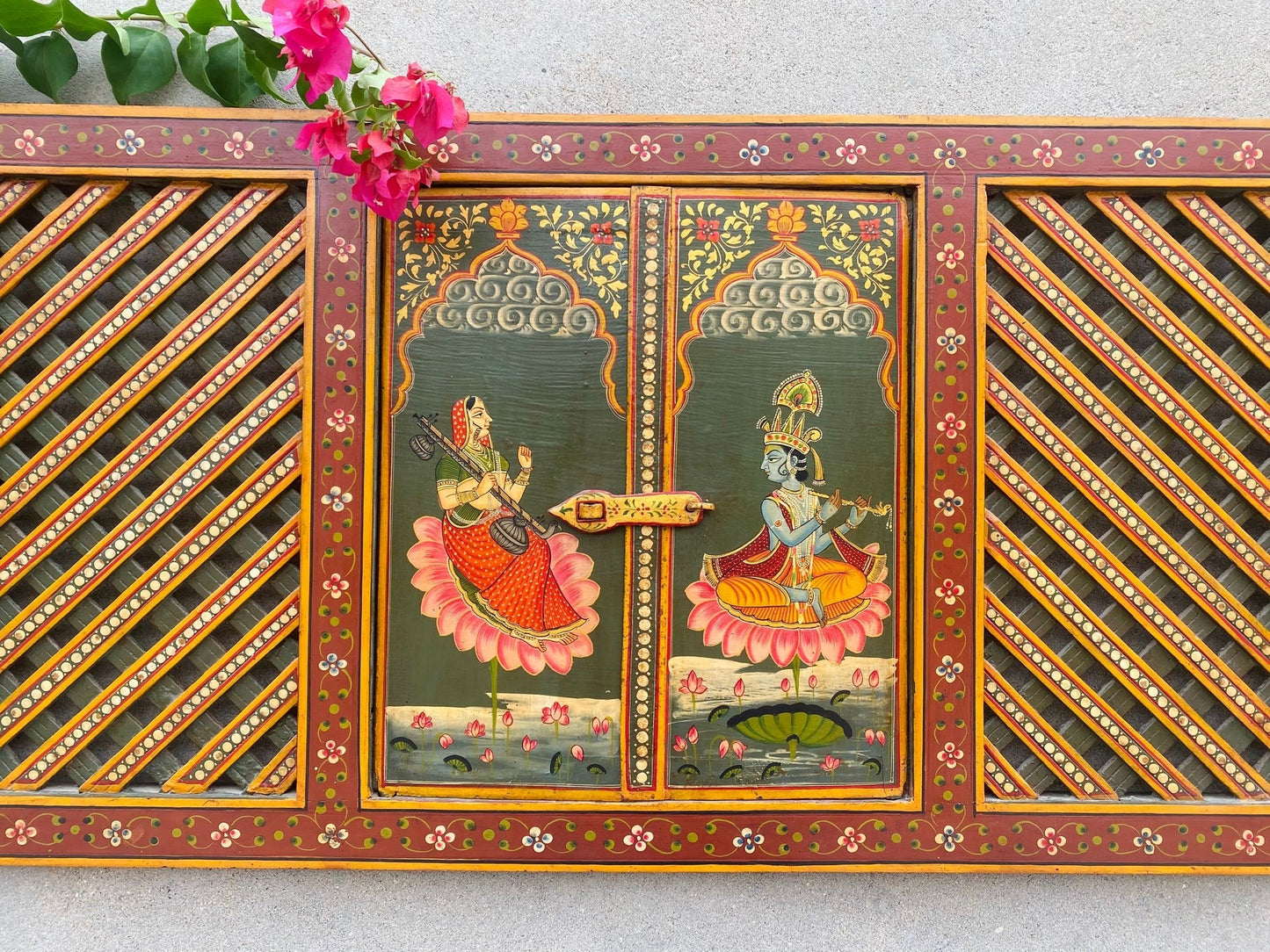 Hand-painted wooden temple window panel with traditional Indian devotional artwork and lattice doors, red and green finish, solid wood wall decor 19x40 inches Traditional hand-painted wooden jharokha style temple panel with opening doors, Indian folk art wall decor 19x40 inches Handcrafted wooden temple window frame with painted deity artwork and lattice panels, Indian wall decor solid wood Indian hand-painted wooden mandir window panel with traditional motifs and hinged doors, Decorative wooden temple pane