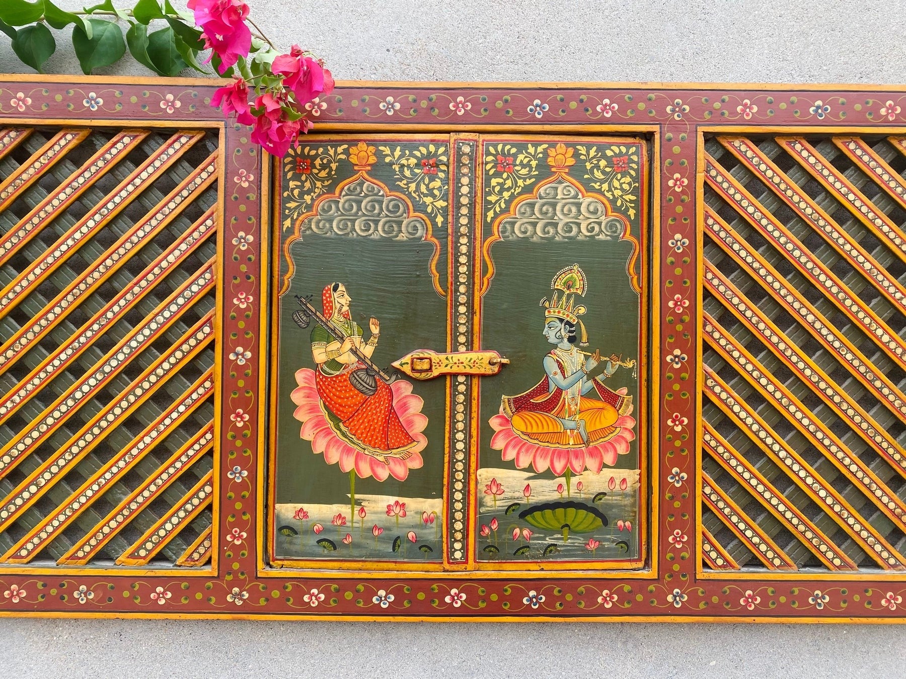 Hand-painted wooden temple window panel with traditional Indian devotional artwork and lattice doors, red and green finish, solid wood wall decor 19x40 inches Traditional hand-painted wooden jharokha style temple panel with opening doors, Indian folk art wall decor 19x40 inches Handcrafted wooden temple window frame with painted deity artwork and lattice panels, Indian wall decor solid wood Indian hand-painted wooden mandir window panel with traditional motifs and hinged doors, Decorative wooden temple pane