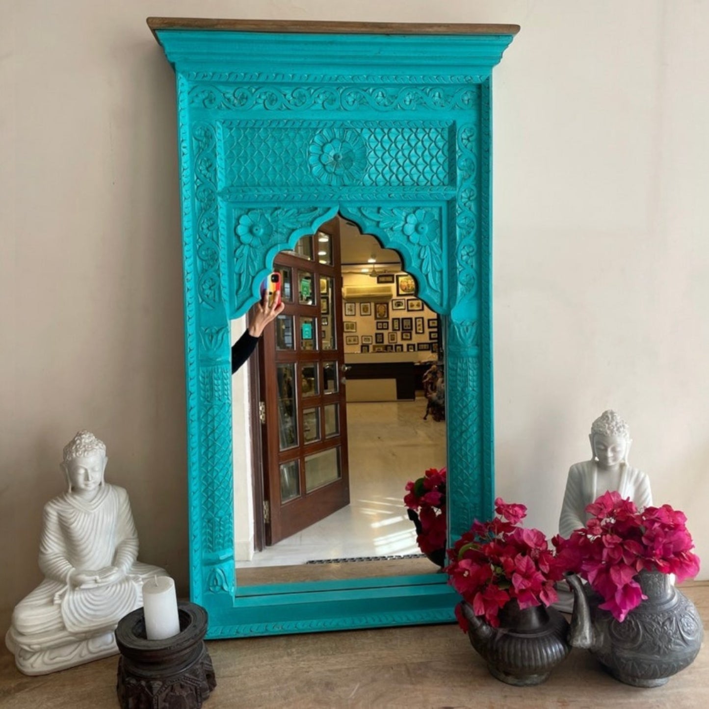 Intricately carved Jharokha mirror frame with antique gold finish, inspired by traditional Indian architecture, adding a royal touch to vintage wall decor or Victorian interiors
