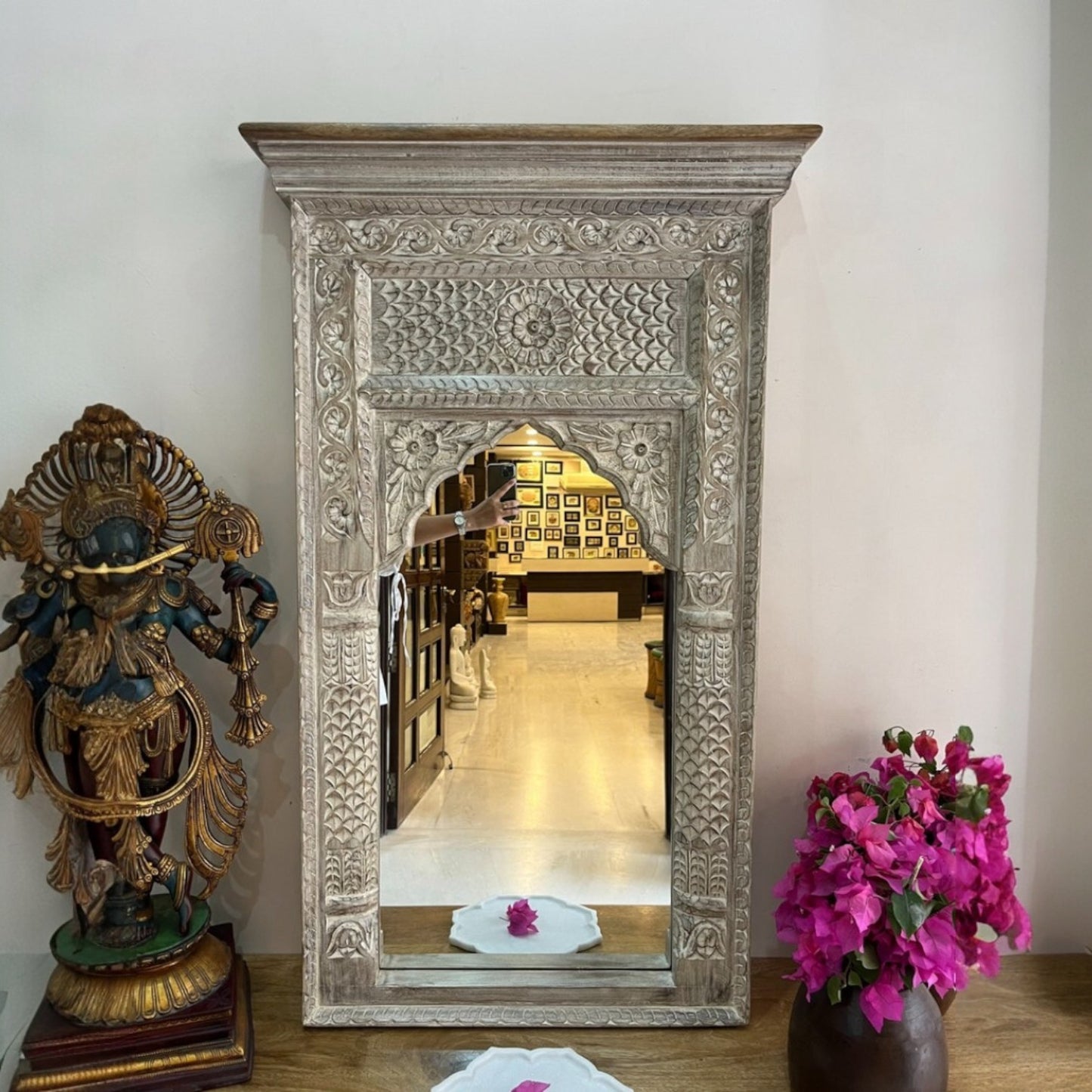 Elegant whitewashed Jharokha mirror frame with a distressed finish, ideal for adding antique charm to bathroom decor or as a centerpiece in living rooms