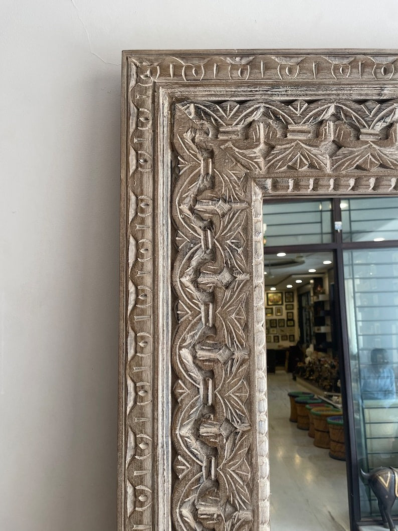 Vintage round mirror framed in a beautifully carved Jharokha design, ideal for small decorative spaces or as a centerpiece for antique wall decor.