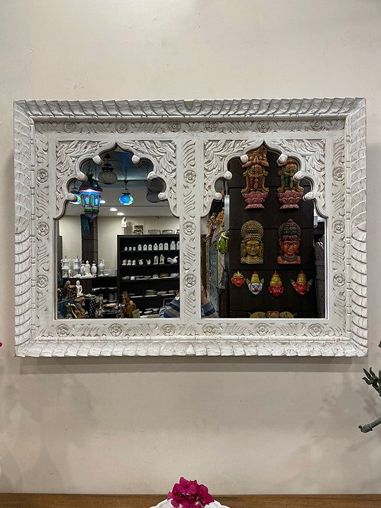 Traditional Jharokha mirror frame in a whitewashed wood finish, blending Indian craftsmanship with rustic home decor style."
