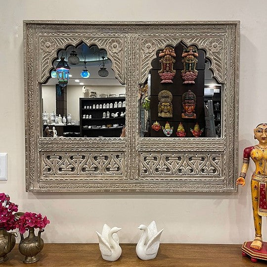 Elegant black framed mirror with Jharokha detailing, ideal for modern rustic interiors and traditional Indian decor